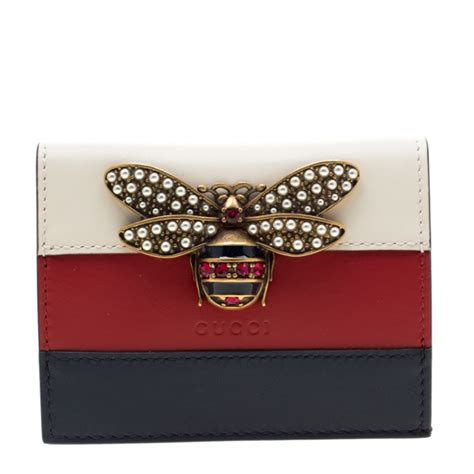 queen margaret gucci wallet.